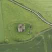 Oblique aerial view of Cessford Castle, taken from the ESE.