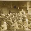 Interior view of Daniel Stewart's College for Boys, Edinburgh showing class room. 
Titled: 'Daniel Stewarts College for Boys. Edinburgh Merchant Company Schools No2'.