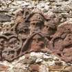 Detail of sculptural panel on east wall with carved heads.