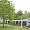 Covered paved area to Spylaw House. View from SE.