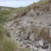 View of the eroding midden deposits, taken from the W.