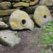 General view of quern stones now sitting within the chapel interior.