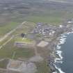 General oblique aerial view of Dounreay Nuclear Development Establishment, looking W.