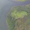 Oblique aerial view centred on Caisteal Bharraich, looking N.
