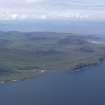 General oblique aerial view of the Ardnamurchan volcano, with Fascadale Bay in the foreground, looking SW.