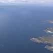 Oblique aerial view of Ardnamurchan lighthouse with Eigg beyond, looking N.