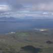 Oblique aerial view of Sanna and Portuairk with Eigg, Muck and Rum beyond, looking N.