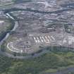 Oblique aerial view of the Glasgow Commonwealth Games Site during construction works, taken from the E.