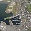 Oblique aerial view of Ardrossan centred on the marina, taken from the SW.