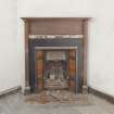 Interior. Detail of fireplace, upper floor north rear room.