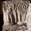 Detail of medieval stone set into font structure.