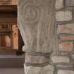 Detail of medieval stone set into font structure.