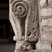 Detail of medieval stone set into font structure.