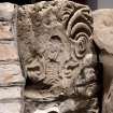 Detail of medieval stone set into font structure.