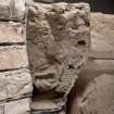 Detail of medieval stone set into font structure.