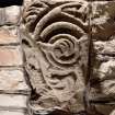 Detail of medieval stone set into font structure.