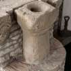 Detail of medieval stone set into font structure.