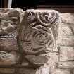 Detail of medieval stone set into font structure.