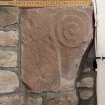 Detail of medieval stone set into font structure.