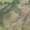 Oblique aerial view centred on the Glasgow University excavation trenches, looking NNW.