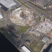 Oblique aerial view of the Scottish Exhibition and Conference Centre showing construction of the Hyrdo, looking NW.