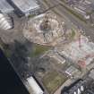 Oblique aerial view of the Scottish Exhibition and Conference Centre showing construction of the Hyrdo, looking NW.