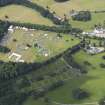 Oblique aerial view of Blair Castle grounds during the Scouts Blair Atholl Jamborette, looking SW.