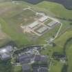 Oblique aerial view of the Macallan Distillery, looking NNW.
