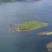 Oblique aerial view of Am Fraoch Eilean and Claig Castle, looking SW.