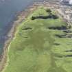 Oblique aerial view of Am Fraoch Eilean and Claig Castle, looking SE.