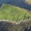 Oblique aerial view of Am Fraoch Eilean and Claig Castle, looking NNE.