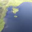 Oblique aerial view of Eilean Mor, Eilean Na Comhairle and Finlaggan Castle, looking NE.