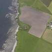 Oblique aerial view centred on the Hillock of Burroughston broch, looking S.