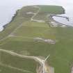 Oblique aerial view of Spurness Wind Farm, Sanday, looking S.