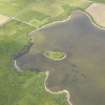 Oblique aerial view of the Loch of Wasbister, centred on the Burrian, looking N.