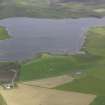 Oblique aerial view of the Loch of Hundland, looking ESE.