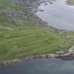General oblique aerial view of the golf course at Point of Ness, looking ENE.
