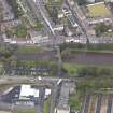 Oblique aerial view of Musselburgh Old Bridge, looking to the NNE.