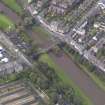 Oblique aerial view of Musselburgh Old Bridge, looking to the W.