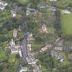 General oblique aerial view of Inveresk Village Road centred on the Manor House, looking to the NW.