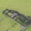 General oblique aerial view of Monkton House with adjacent stable, looking to the S.