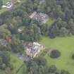 General oblique aerial view of Carberry Tower with adjacent stable block and Italian Garden, looking to the NE.
