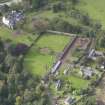 General oblique aerial view of Winton House with adjacent walled garden, looking to the W.