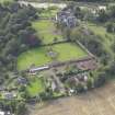 General oblique aerial view of Winton House with adjacent walled garden, looking to the SE.