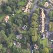 Oblique aerial view of Winton House South Lodge, looking to the E.