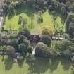 General oblique aerial view of Pilmuir House with adjacent dovecot, looking to the SSE.