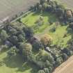 General oblique aerial view of Pilmuir House with adjacent dovecot, looking to the SE.