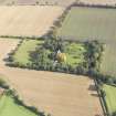 General oblique aerial view of Pilmuir House with adjacent dovecot, looking to the NE.