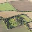 General oblique aerial view of Pilmuir House with adjacent dovecot, looking to the W.