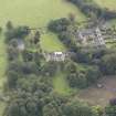 General oblique aerial view of Keith Marischal Country House with adjacent stables, looking to the SSE.